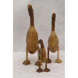 A WOODEN DUCK FAMILY TO INCLUDE DADDY DUCK, MUMMY DUCK AND BABY DUCK