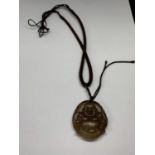 A CARVED BUDDHA PENDANT