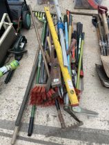 AN ASSORTMENT OF GARDEN TOOLS TO INCLUDE SHEARS, RAKES AND LOPPERS ETC