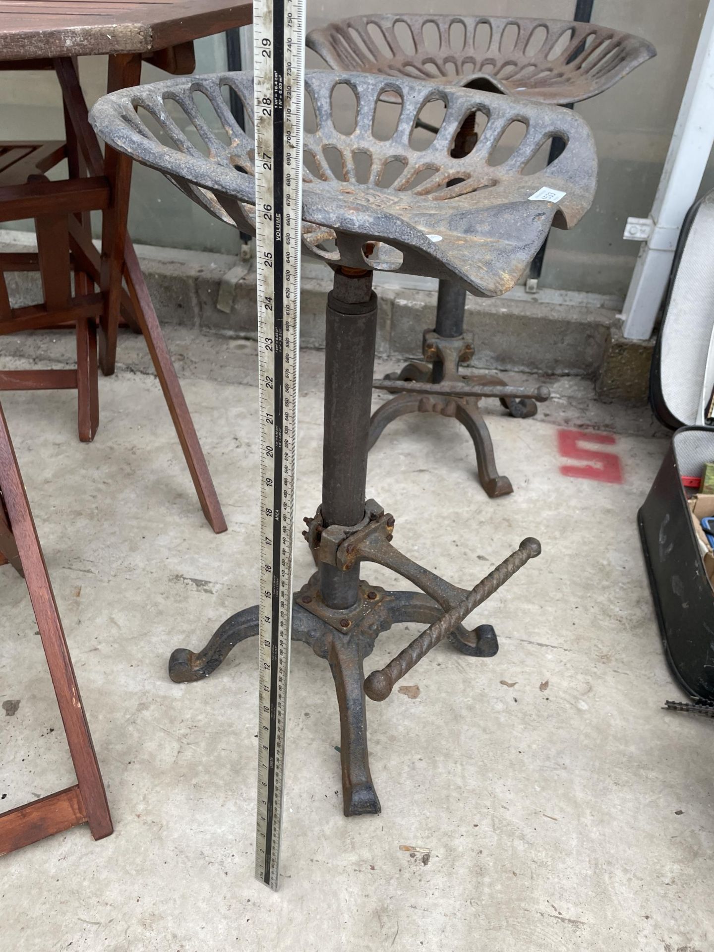 A PAIR OF VINTAGE INDUSTRIAL STYLE STOOLS WITH IMPLEMENT SEATS - Image 4 of 5