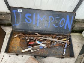 A METAL TOOL BOX WITH AN ASSORTMENT OF TOOLS TO INCLUDE SPANNERS ETC