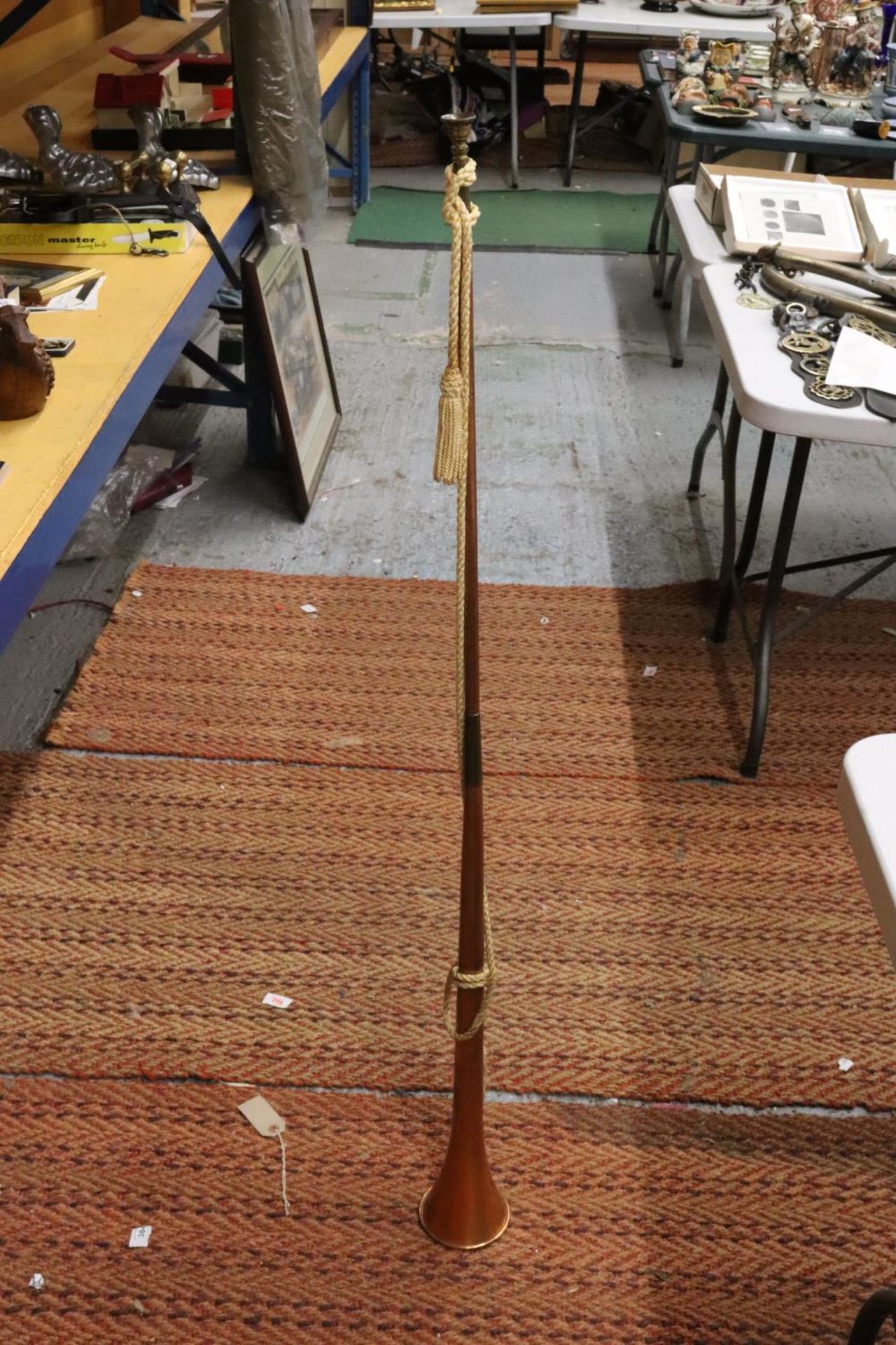 A BRASS AND COPPER HUNTING HORN