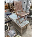 A WOODEN POTTING BENC AND A FOLDING TEAK CHAIR