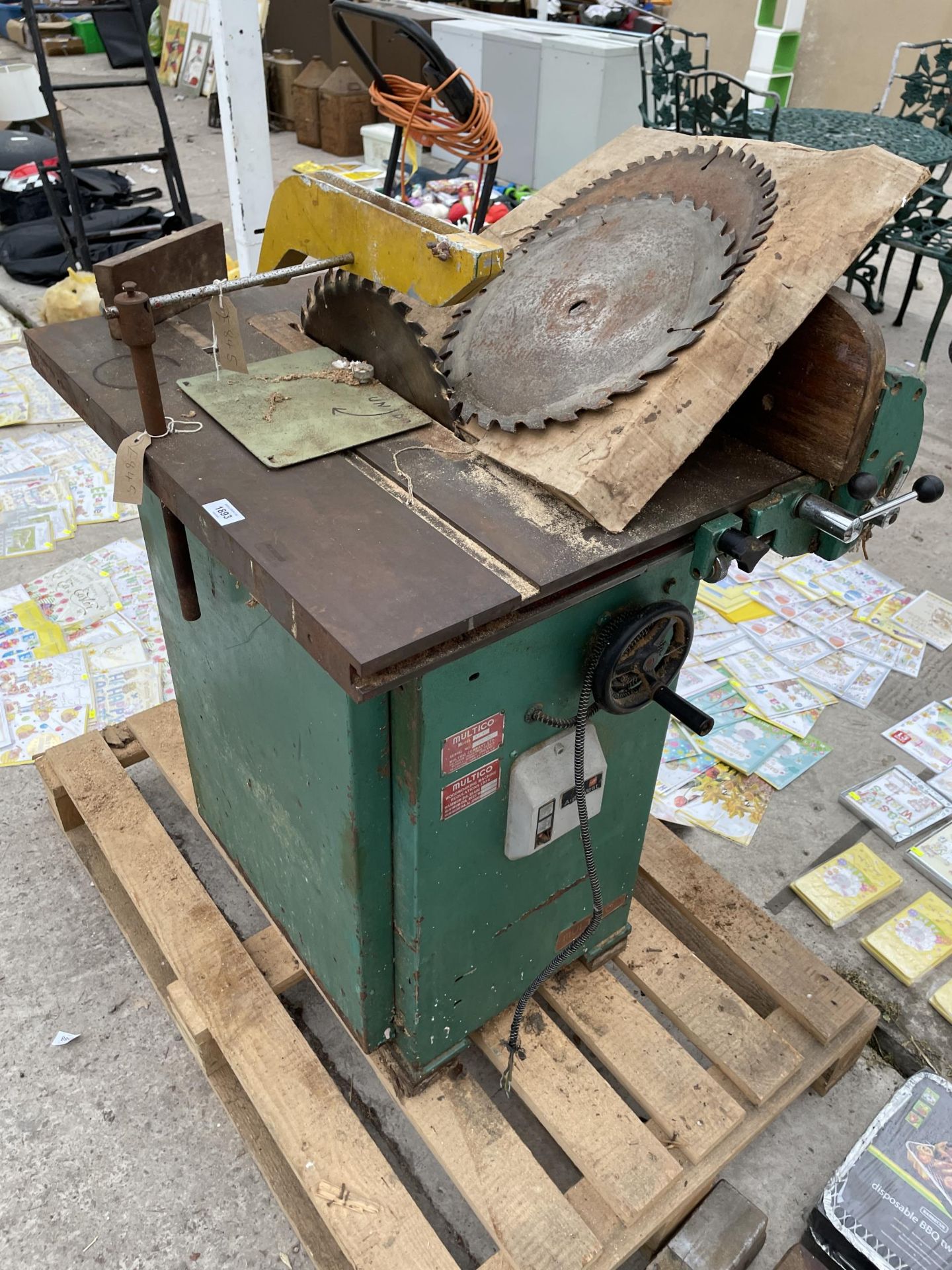 A HEAVY DUTY MULTICO TABLE SAW, WITH SPARE CUTTING DISCS