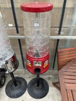 A PRINGLES POTS DISPENSING MACHINE COMPLETE WITH KEY