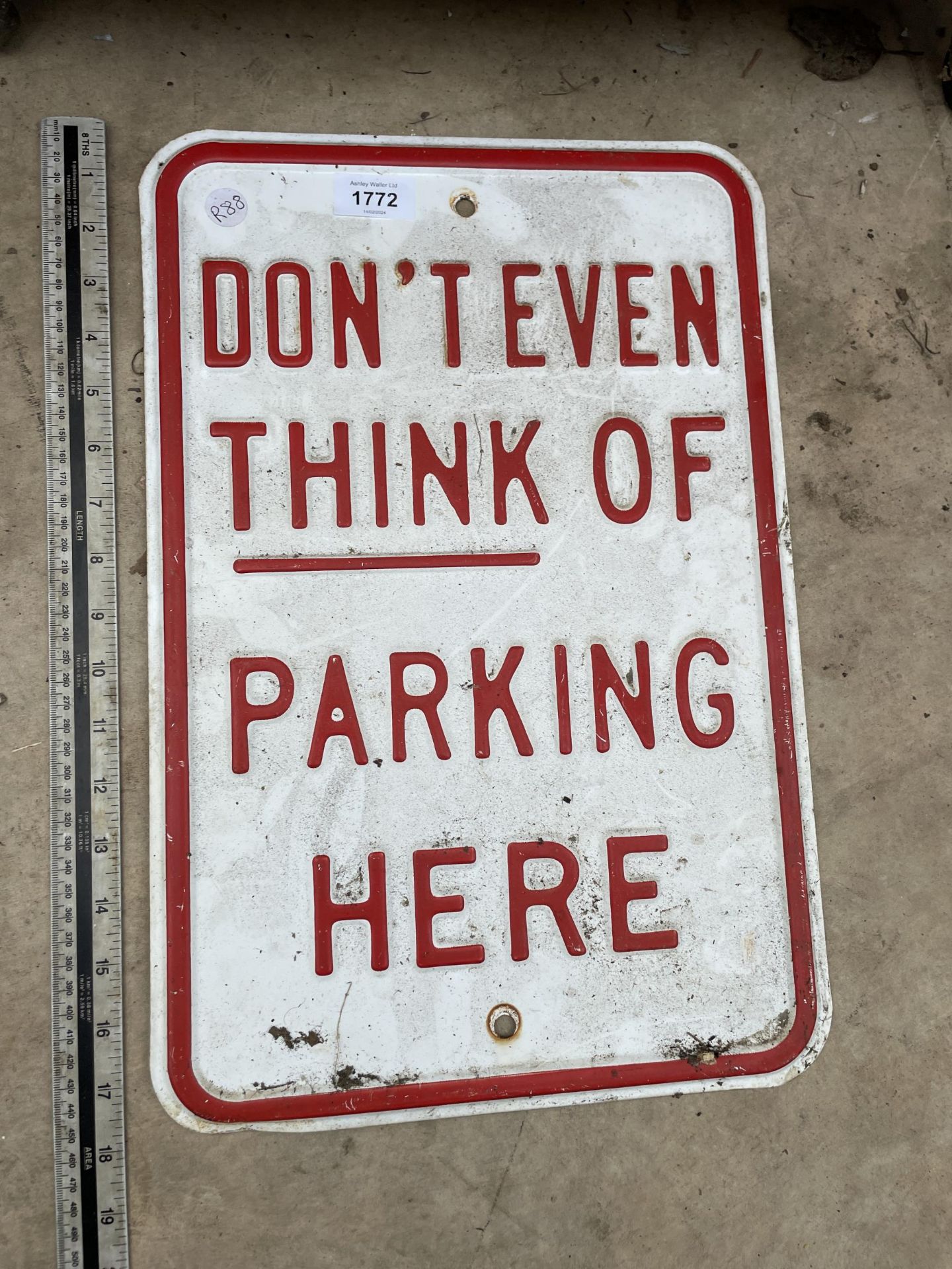 A TIN PARKING SIGN