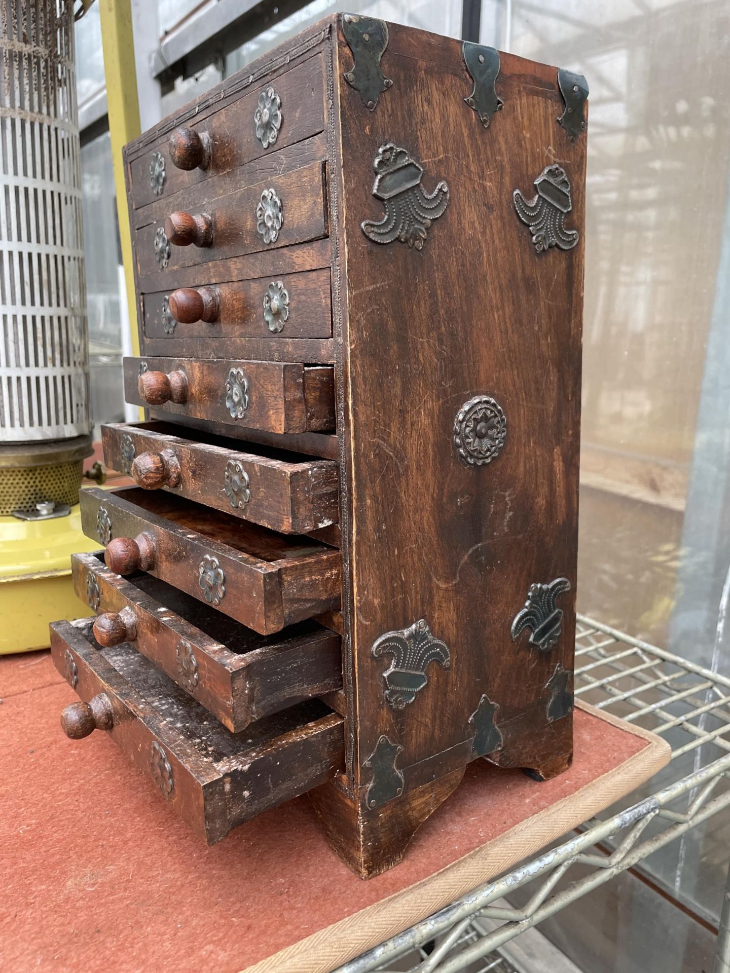 A MINIATURE INDIAN HARDWOOD CHEST OF EIGHT DRAWERS - Image 5 of 6