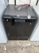 A BLACK UNDERCOUNTER DISH WASHER