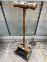 A VINTAGE WOODEN BOOT BRUSH WITH 'LORD ROBERTS WORKSHOP' PLAQUE