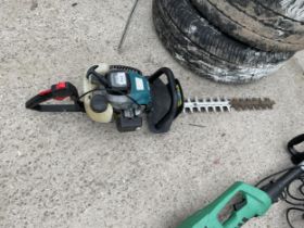 A MAKITA PETROL ENGINE HEDGE TRIMMER