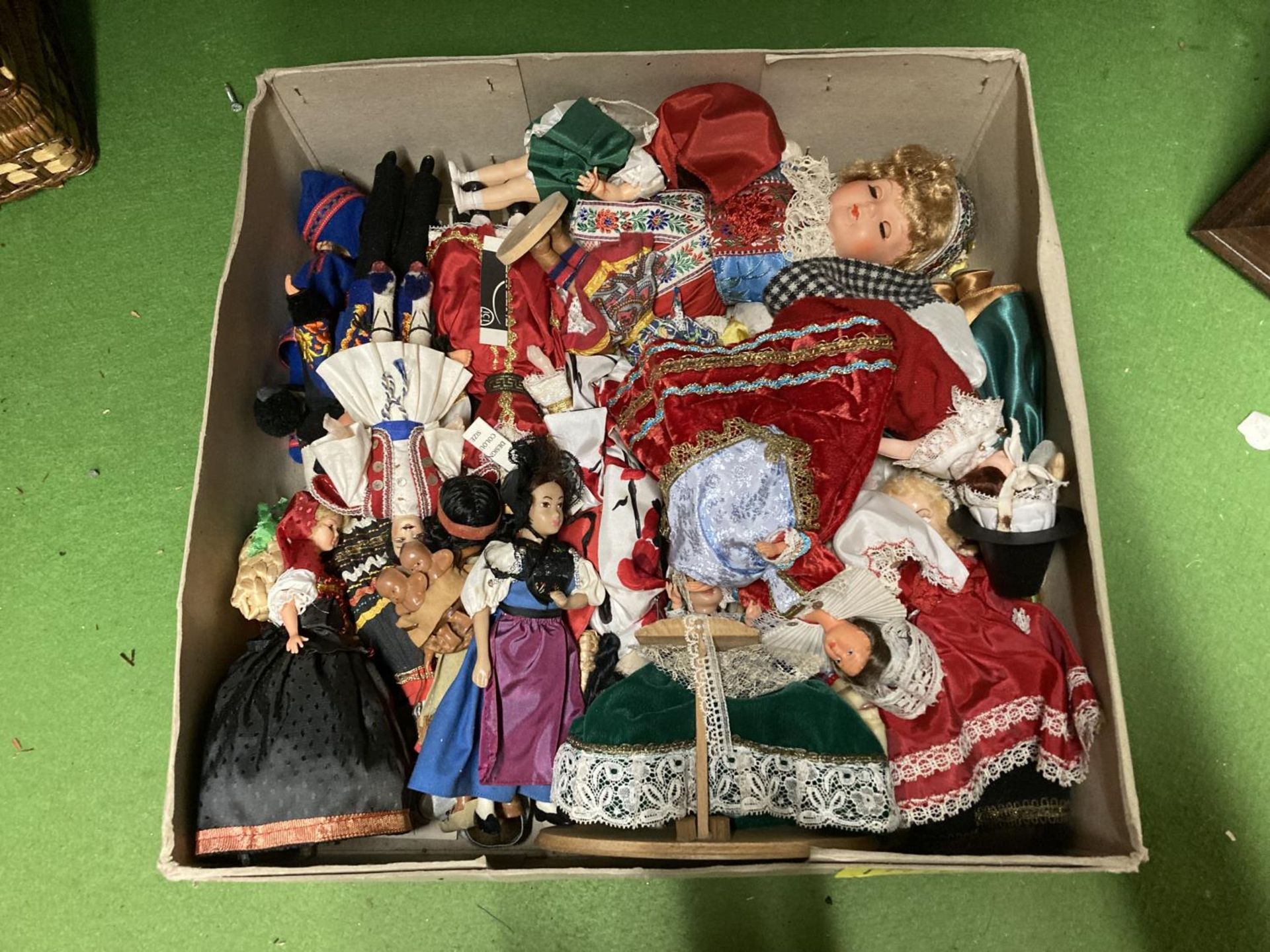 A LARGE COLLECTION OF DOLLS FROM AROUND THE WORLD