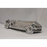 A CHROME MODEL OF A VINTAGE RACING CAR - APPROX 50 CM IN LENGTH