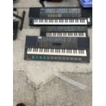 THREE ELECTRIC KEYBOARDS TO INCLUDE A CASIO AND A YAMAHA