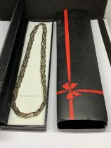 A MARKED 925 SILVER FOUR STRAND TWISTED NECKLACE IN A PRESENTATION BOX