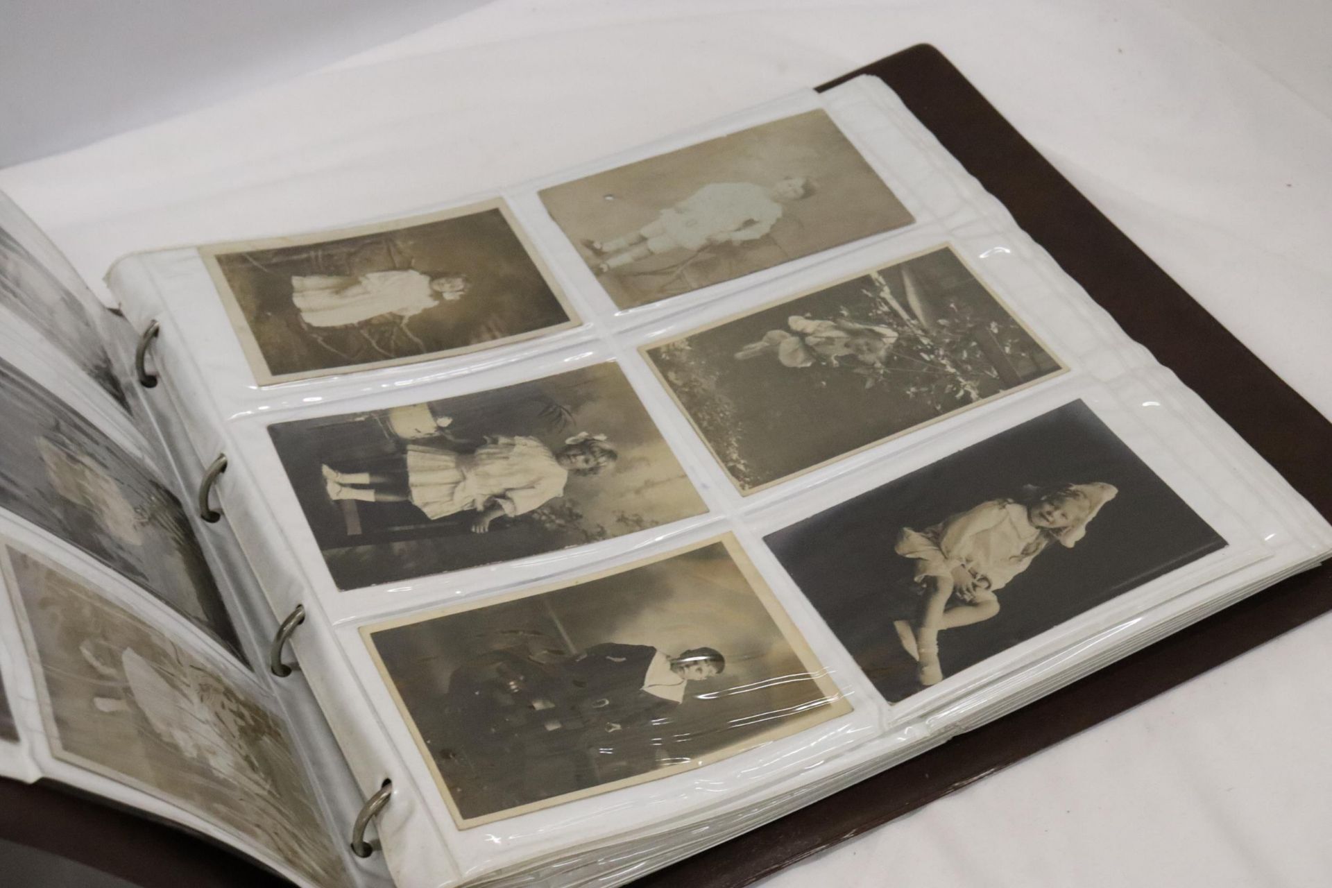 AN ALBUM CONTAINING A COLLECTION OF SEPIA VICTORIAN PHOTOGRAPHS - Bild 3 aus 5