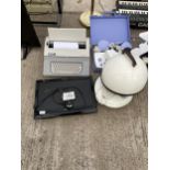 AN ASSORTMENT OF ITEMS TO INCLUDE A TELEVISION AND A TYPEWRITER ETC