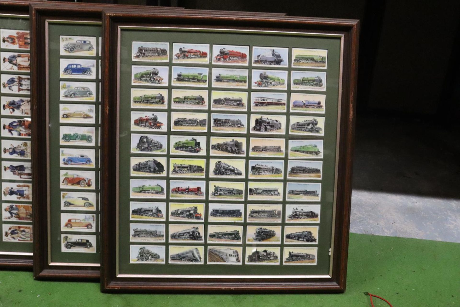 THREE FRAMED COLLECTIONS OF TRAINS, CARS AND NAVAL UNIFORMS - Image 2 of 4