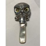 A SILVER AND MOTHER OF PEARL OWL BABY RATTLE