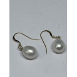 A PAIR OF 14 CARAT GOLD AND PEARL EARRINGS GROSS WEIGHT 3.57 GRAMS