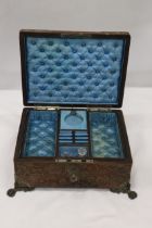 A SILK LINED, LEATHER CLAD JEWELLERY/SEWING BOX WITH TWO SCENT BOTTLES, A LIFT OUT COMPARTMENT AND