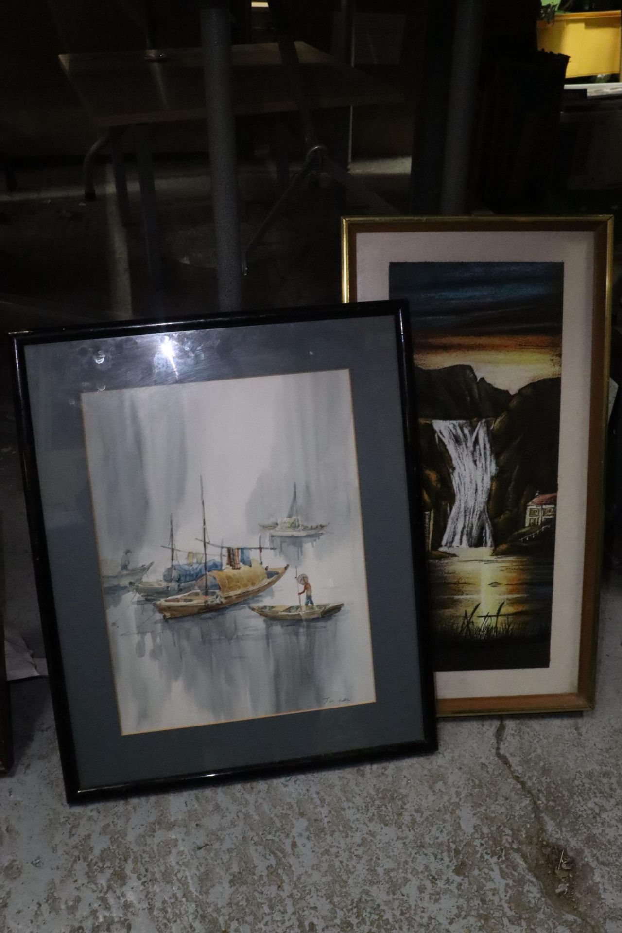 TWO FRAMED PRINTS ONE OF A WATERFALL AND AN ORIENTAL OF BOATS