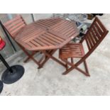 A WOODEN FOLDING PATIO TABLE AND TWO CHAIRS