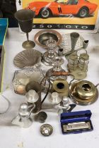 A QUANTITY OF SILVER PLATED AND BRASS ITEMS TO INCLUDE CANDLESTICKS, A LARGE GOBLET, ANGEL CANDLE