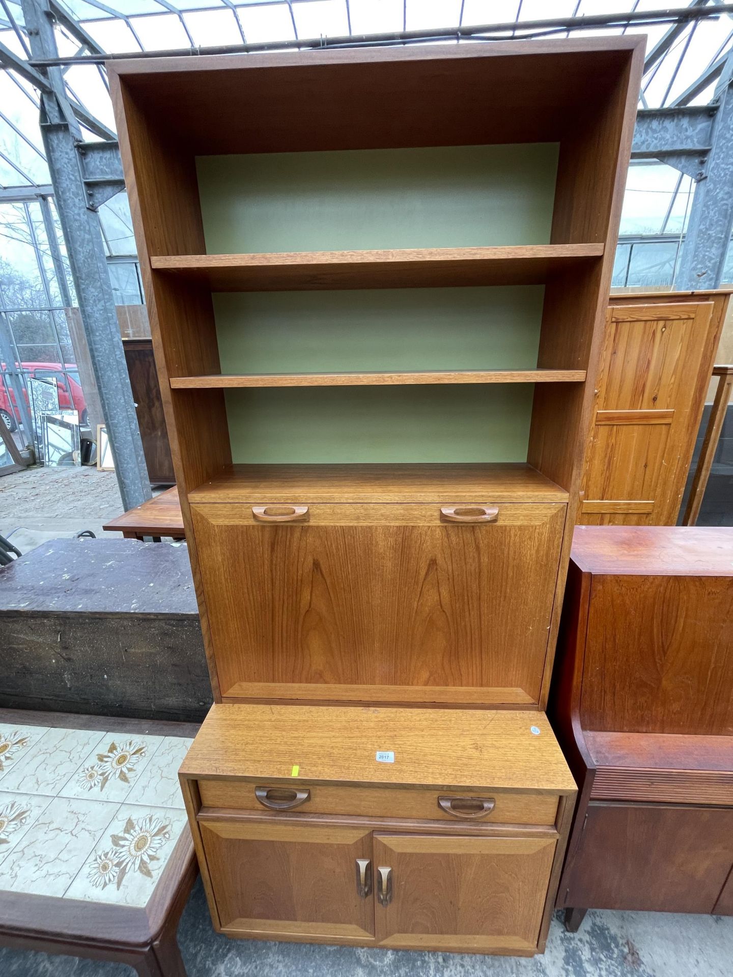 A RETRO TEAK G-PLAN COCKTAIL CABINET WITH DRAWERS AND CUPBOARDS TO BASE, 33" WIDE