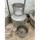 THREE LARGE ALUMINIUM COOKING POTS, ONE COMPLETE WITH LID