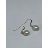 A PAIR OF 14 CARAT GOLD AND PEARL EARRINGS GROSS WEIGHT 3.62 GRAMS