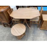 A MODERN PEDESTAL DINING TABLE, TWO CHAIRS AND A LOW OCCASIONAL TABLE