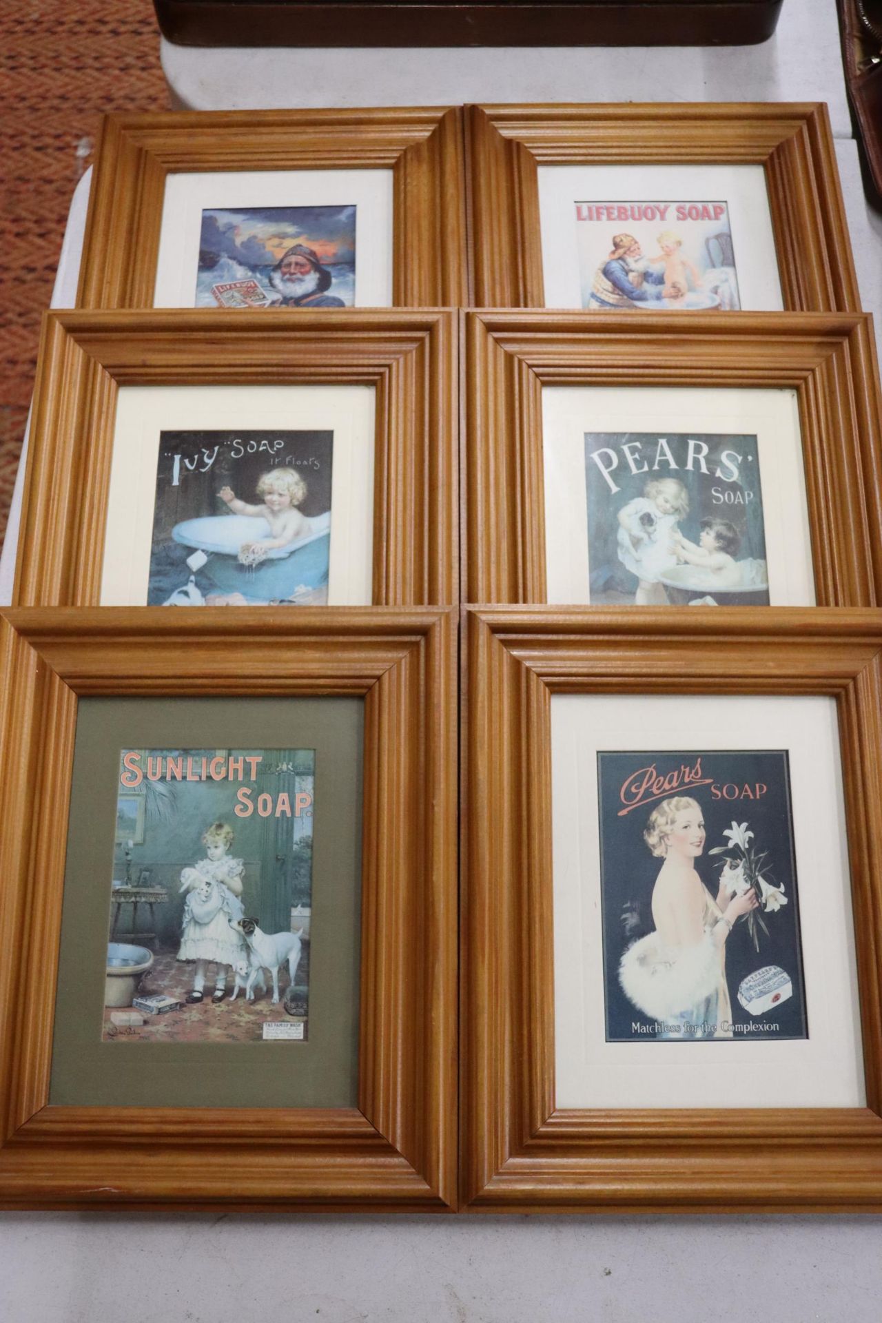 SIX FRAMED ADVERTISING PRINTS TO INCLUDE PEARS' AND LIFEBUOY SOAP, 23CM X 28CM