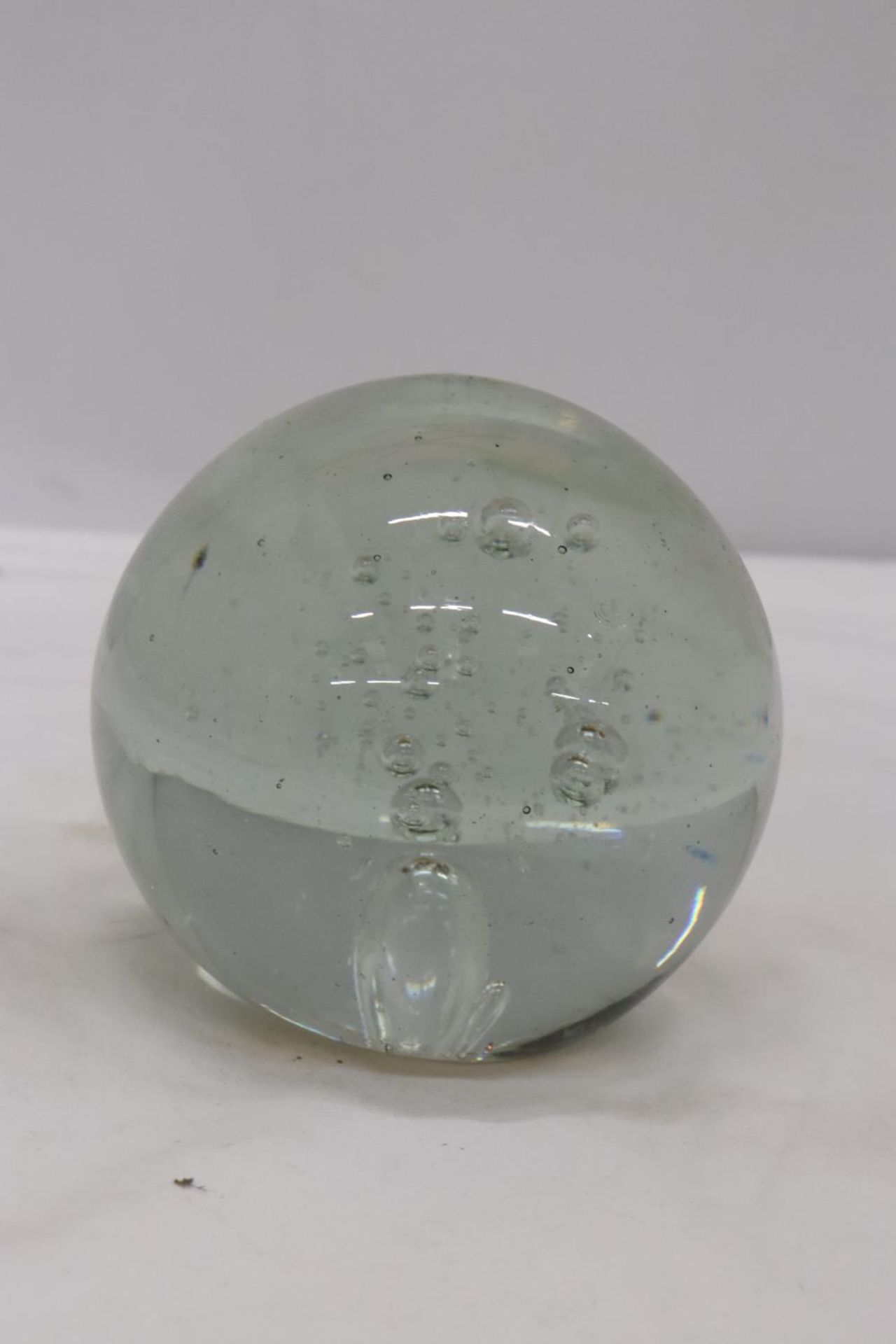 A LARGE VINTAGE GLASS DUMP PAPERWEIGHT