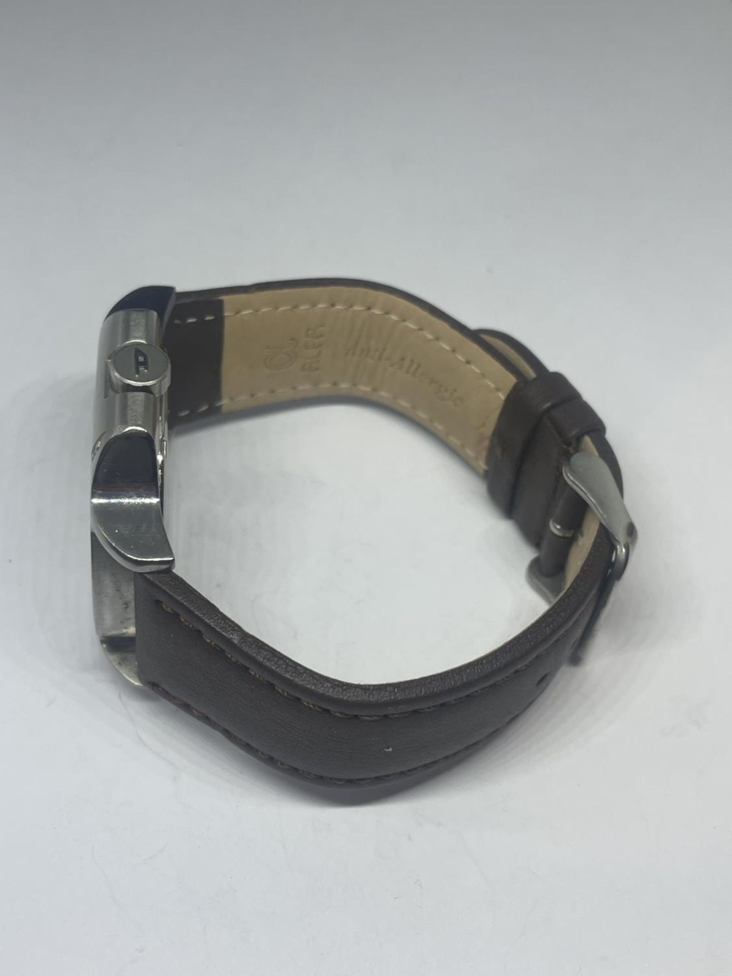 A DIESEL DAY AND DATE WRIST WATCH SEEN WORKING BUT NO WARRANTY - Image 2 of 3