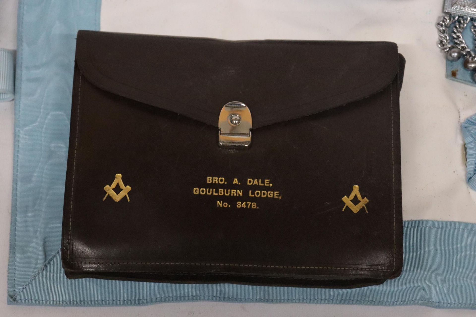 A MASONIMC APRON IN A LEATHER POUCH BELONGED TO BRO. A. DALE, GOULBURN LODGE, NO. 8478 - Image 2 of 5