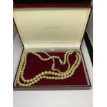 TWO PEARL NECKLACES IN A PRESENTATION BOX