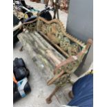 A WOODEN GARDEN BENCH WITH HEAVILY DECORATIVE CAST BENCH ENDS AND CAST BACK WITH COUNTRYSIDE THEME