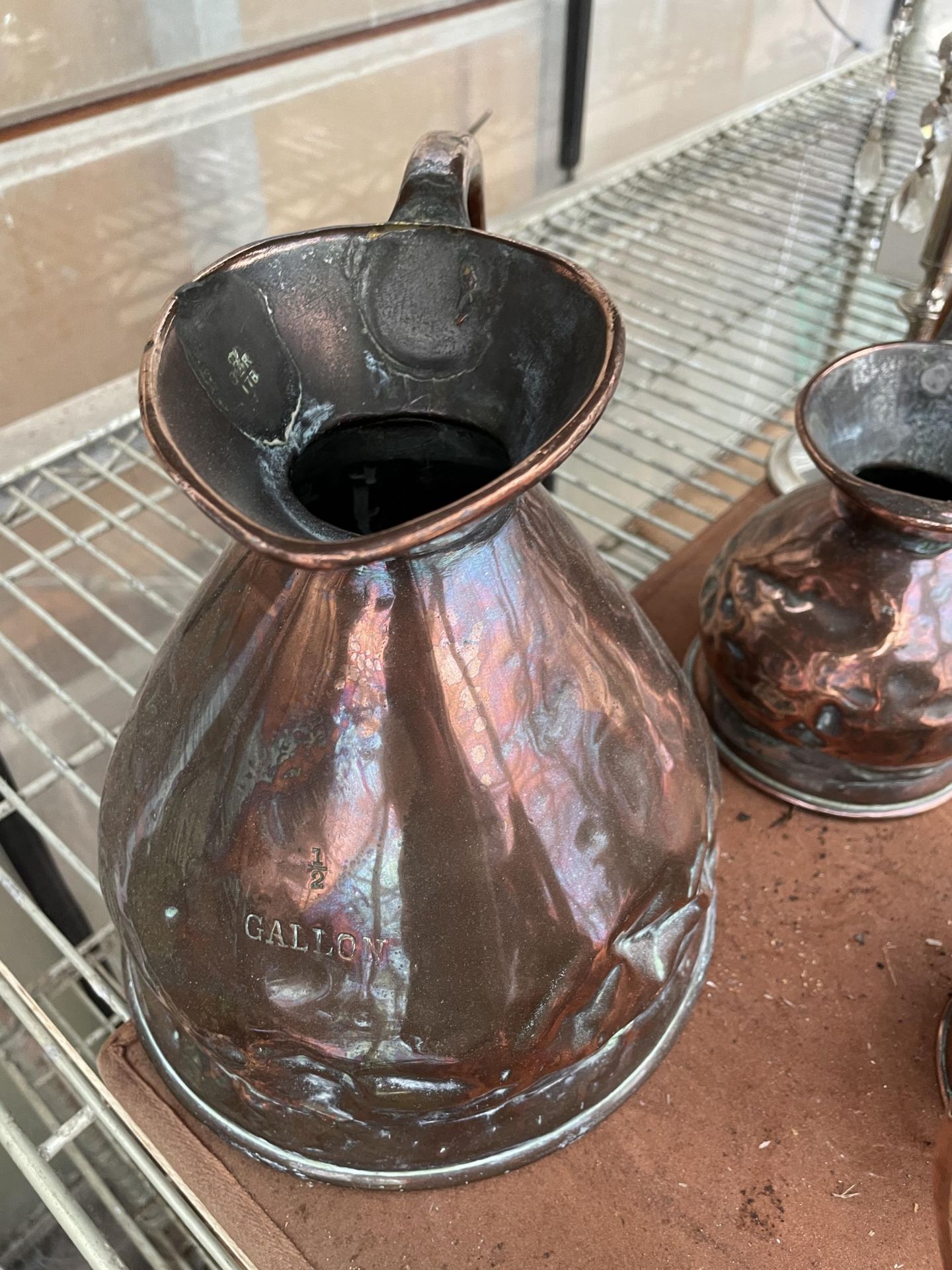 A COLLECTION OF FOUR GRADUATED VINTAGE COPPER MEASURING JUGS - Image 3 of 3