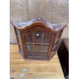 A MODERN GLAZED WALL DISPLAY CABINET WITH ARCHED TOP, 22" WIDE