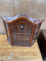 A MODERN GLAZED WALL DISPLAY CABINET WITH ARCHED TOP, 22" WIDE