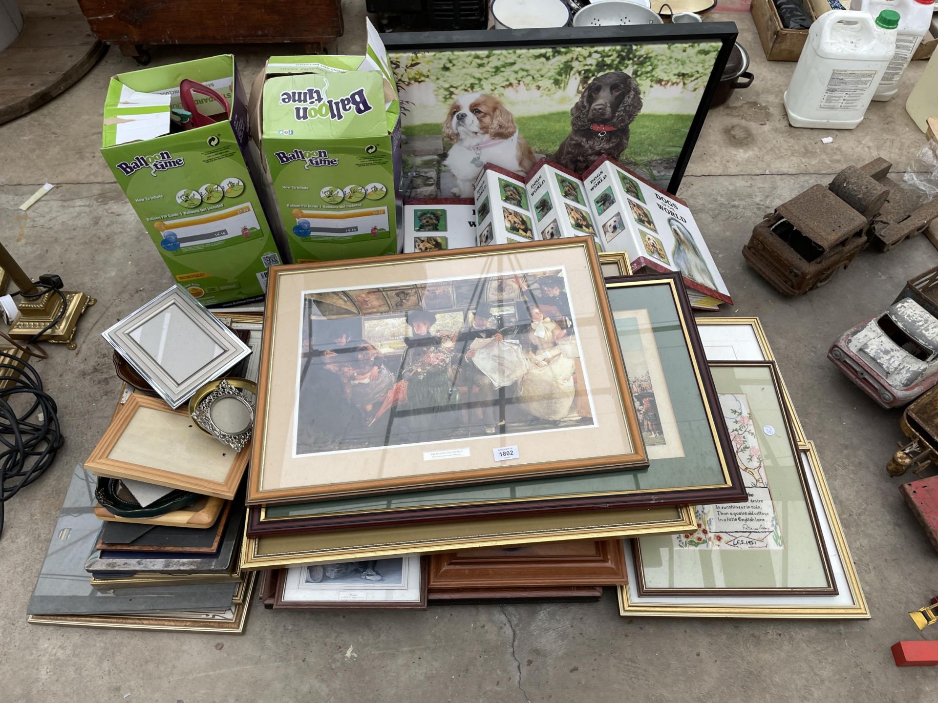 AN ASSORTMENT OF ITEMS TO INCLUDE FRAMED PRINTS AND PICTURES, EMPTY PICTURE FRAMES AND DOG FOLDERS