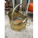 A VINTAGE BRASS FIRESIDE COAL BUCKET