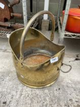 A VINTAGE BRASS FIRESIDE COAL BUCKET