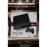 A BOXED PLAYSTATION 3, 160 GB WITH A CONTROLLER AND POWER CABLE