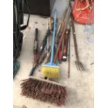 AN ASSORTMENT OF GARDEN TOOLS TO INCLUDE SHEARS, BRUSHES AND FORKS ETC