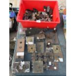 A LARGE ASSORTMENT OF VINTAGE LIGHT SWITCHES AND ELEVATOR BUTTONS ETC