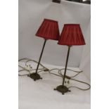 A PAIR OF LAMPS WITH PLEATED SHADES AND BRASS STANDS