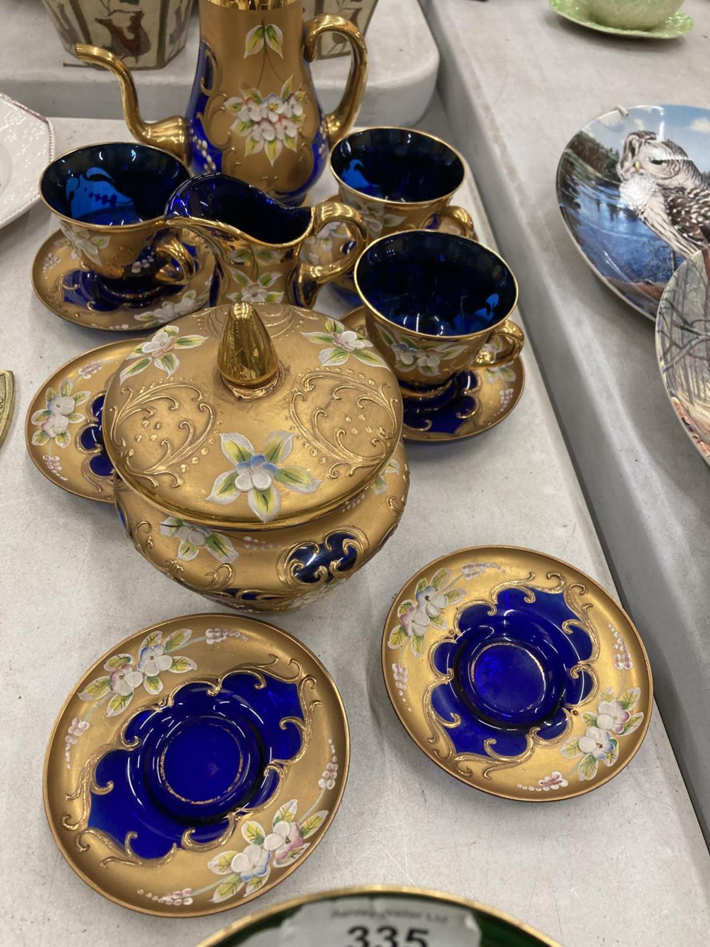 A COLLECTION OF BOHEMIAN BLUE GLASSWARE WITH GILT AND FLORAL PATTERN TO INCLUDE A SMALL COFFEE - Image 3 of 4