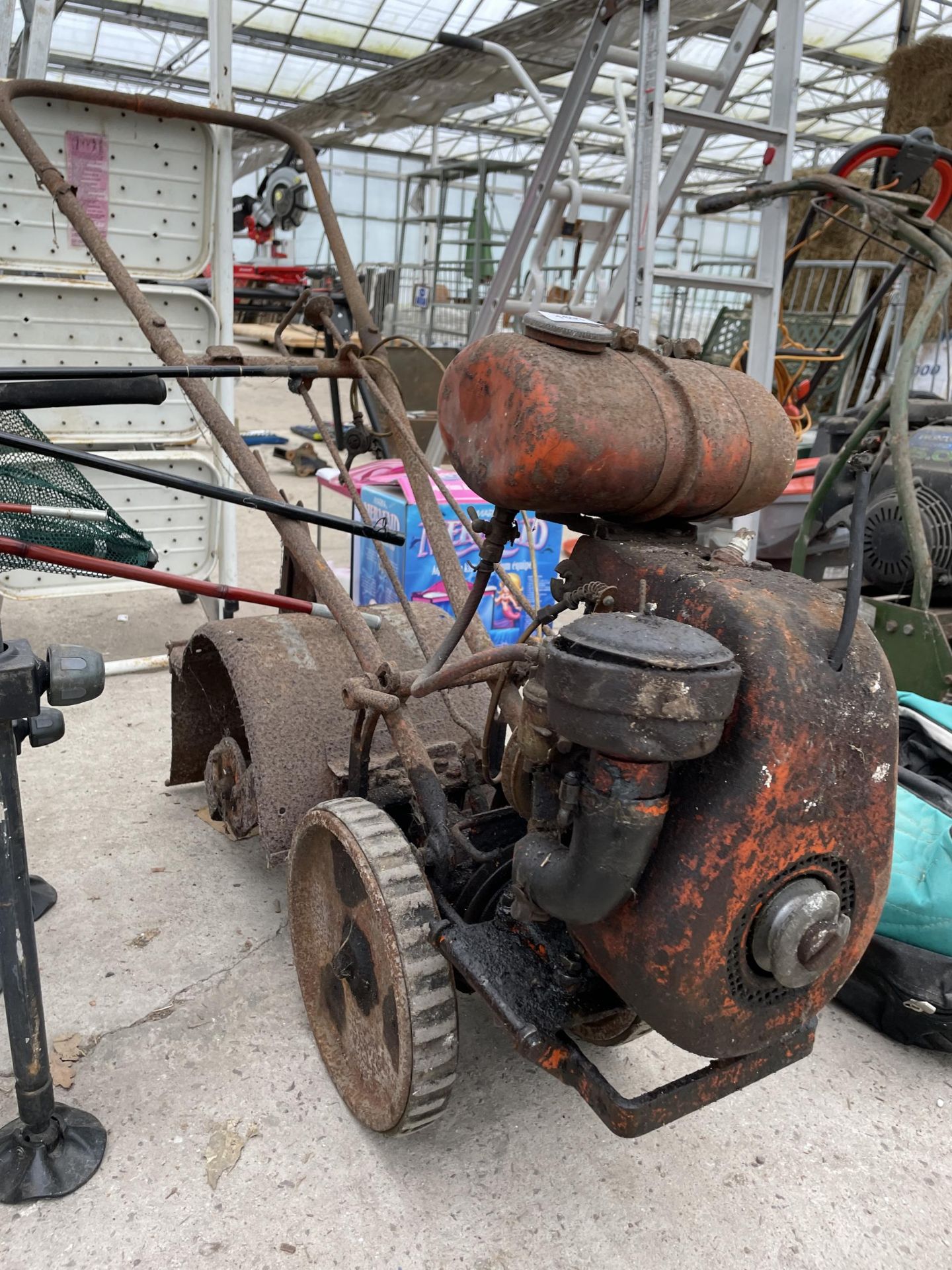 A VINTAGE PETROL ENGINE GARDEN ROTAVATOR