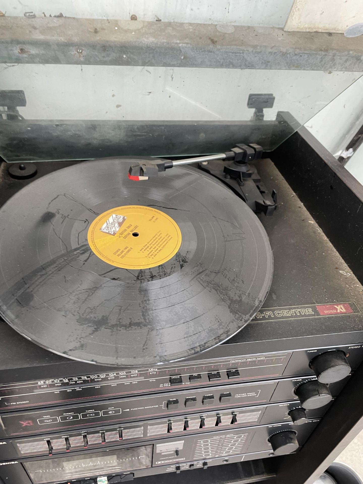 A RECORD CABINET WITH AN ASSORTMENT OF TOSHIBA STEREO ITEMS TO INCLUDE A CASSETTE DECK, RECORD - Image 2 of 2